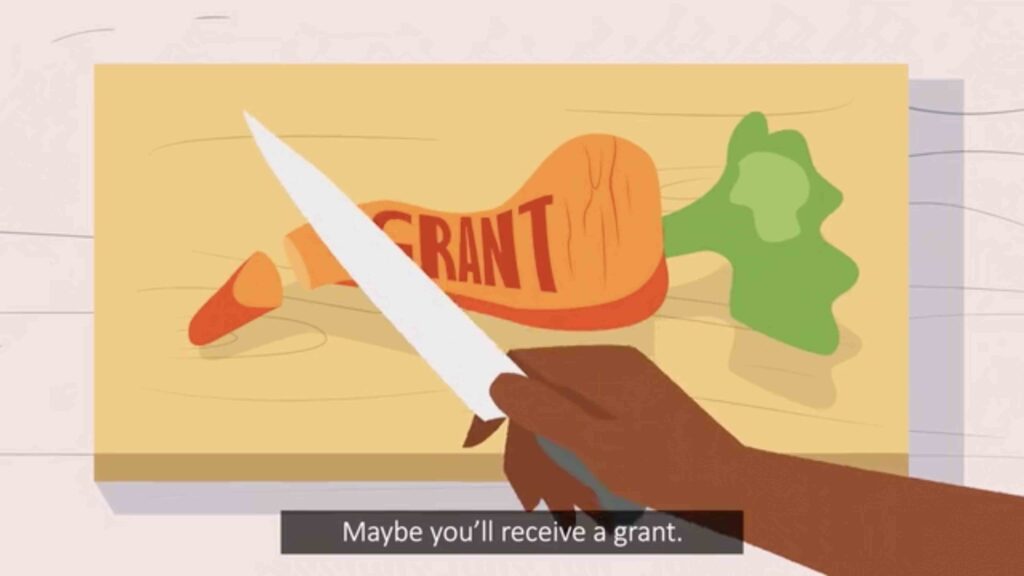 A close up of a cartoon woman chopping a carrot with the word “Grant” written on it.