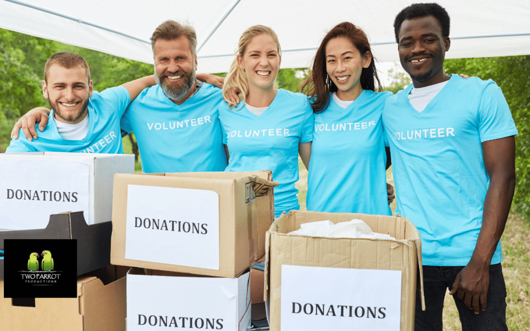 An image showing a group of people holding hands and smiling while fundraising